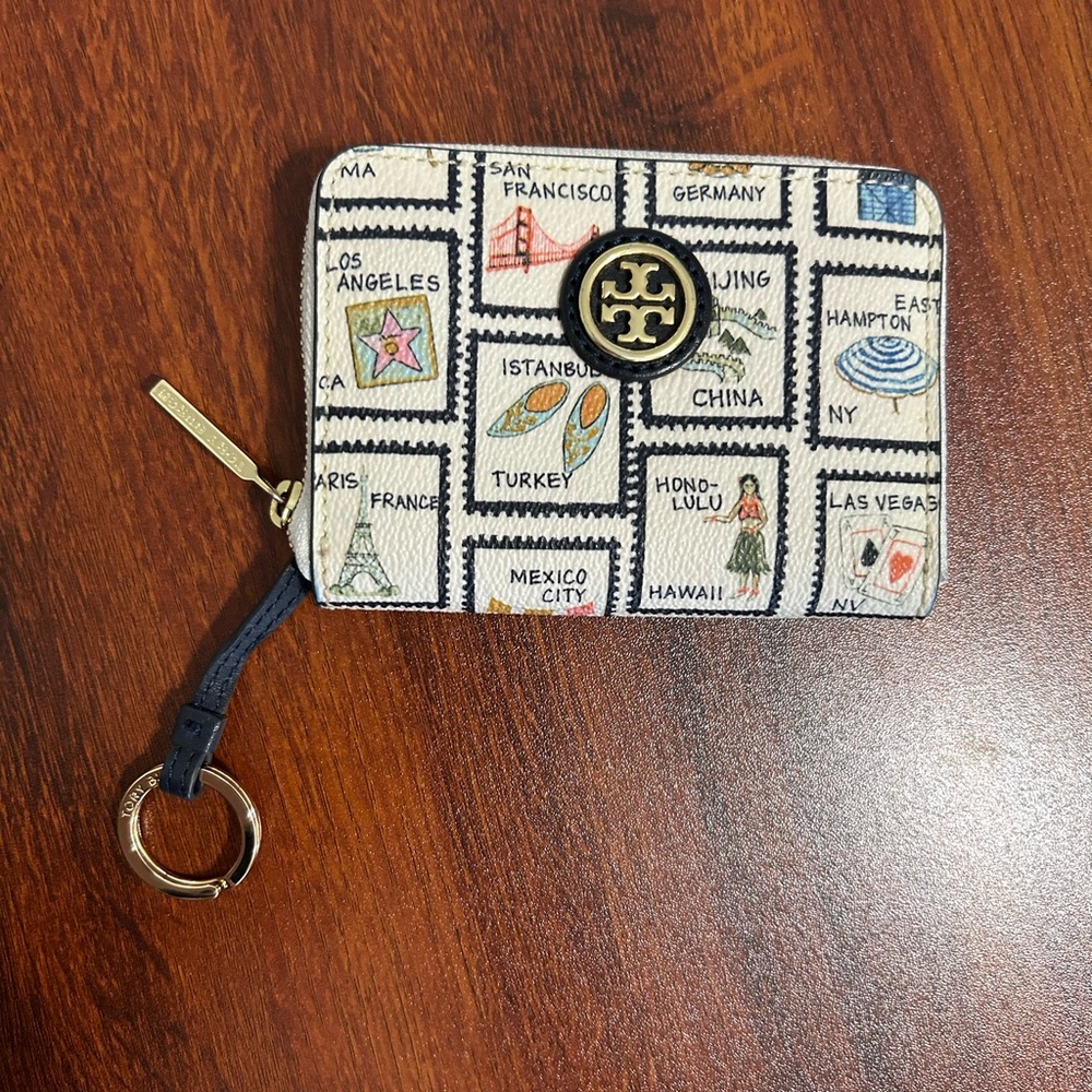 Tory Burch White & Black Travel Print Compact Wallet in very good used condition